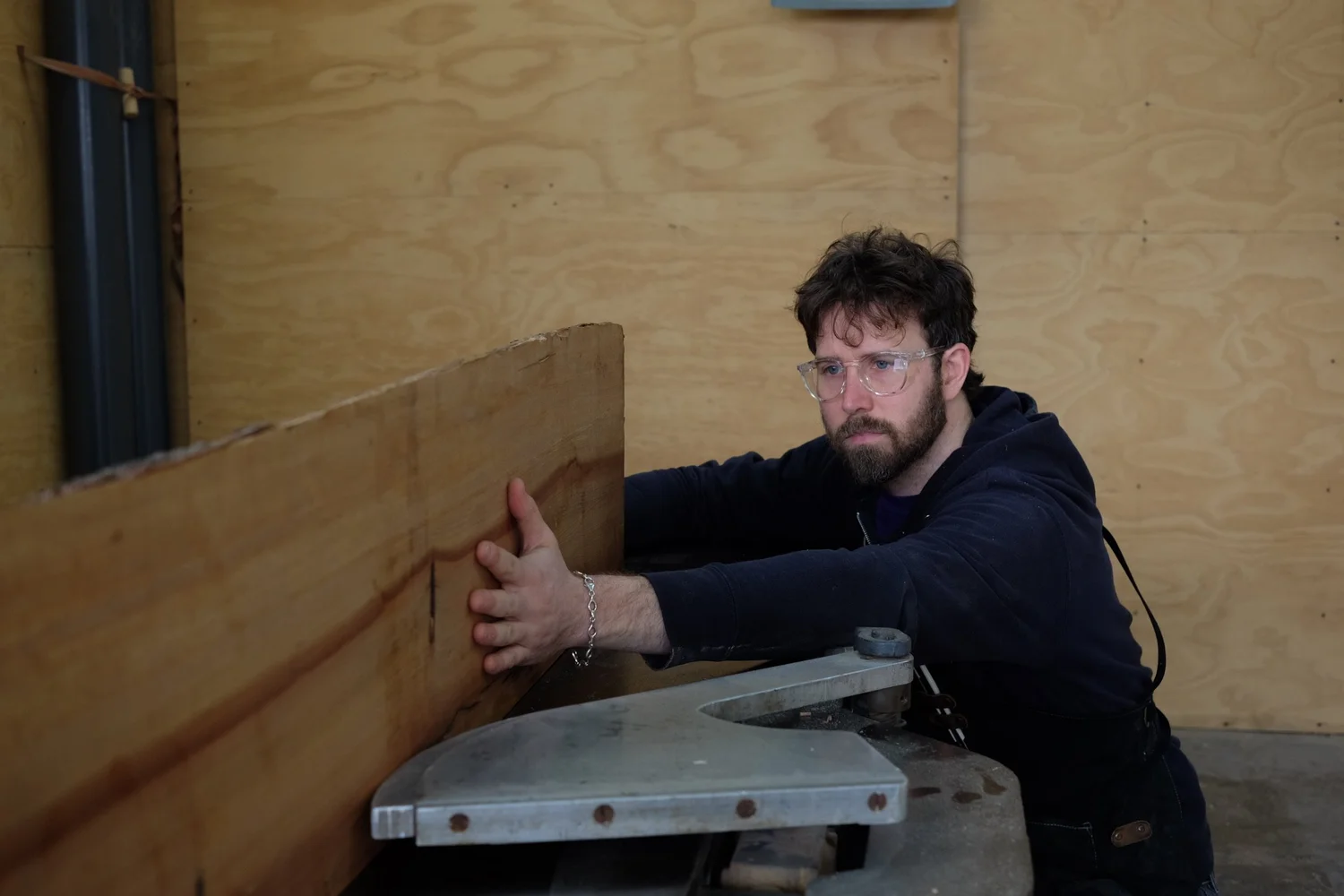 Furniture maker and designer David Flatow working in the workshop